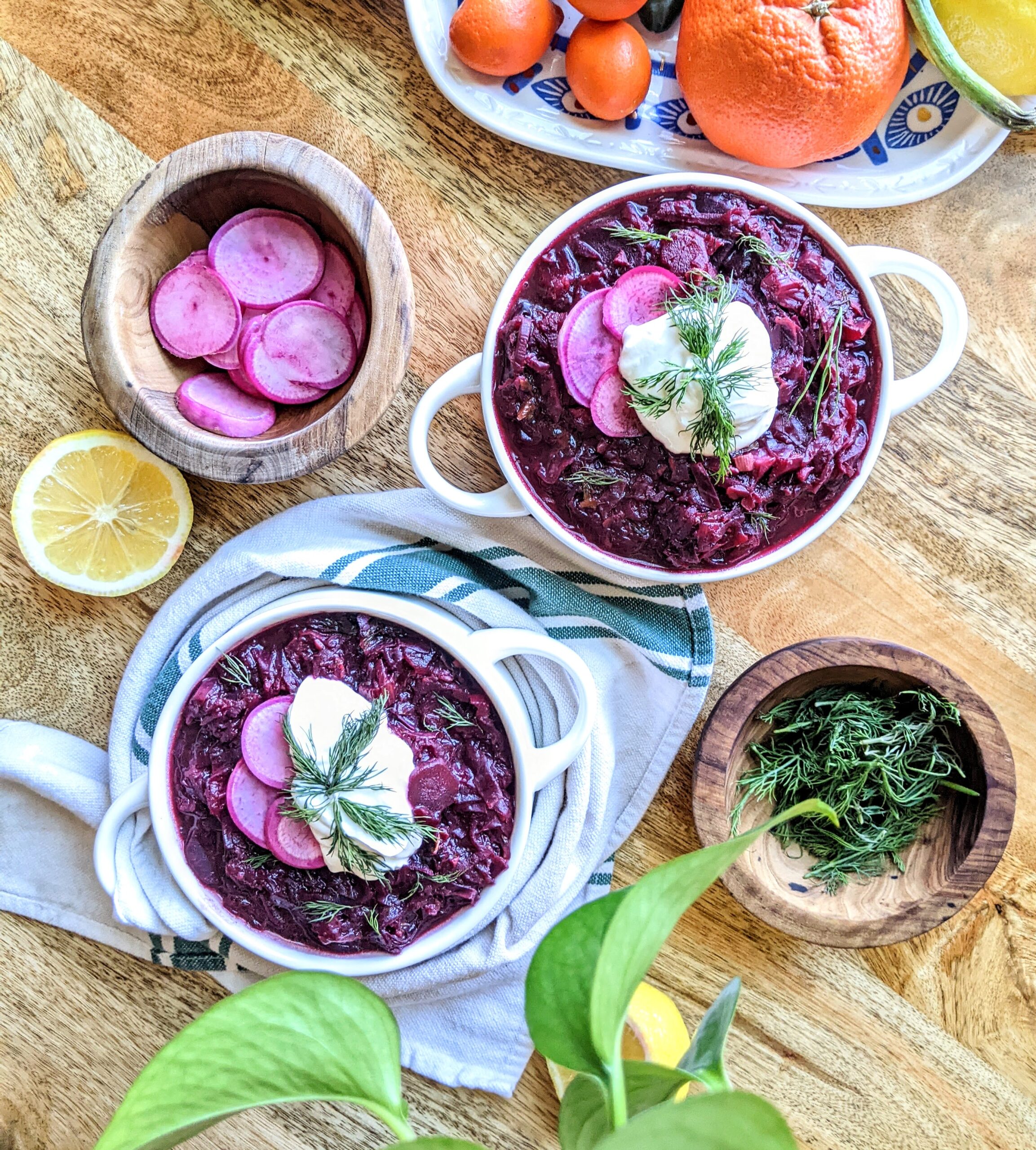 Vibrant Purple Vegetarian Borscht with Sour Cream and Radishes