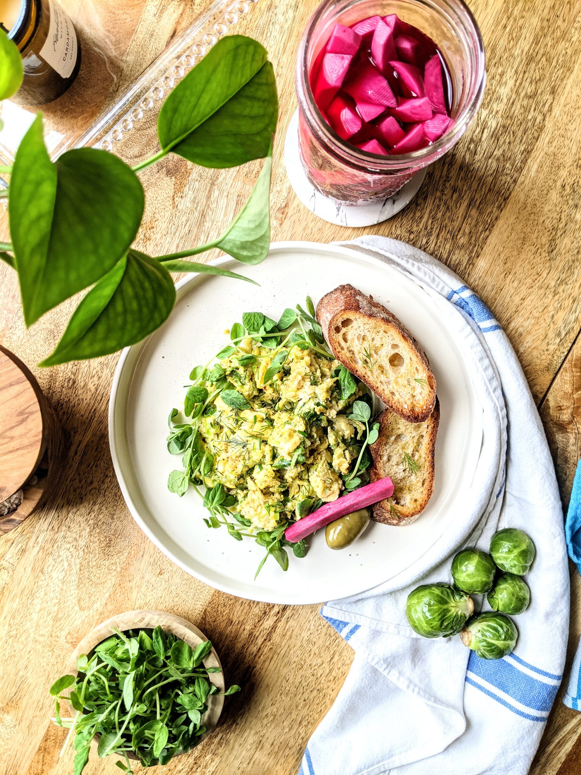 Brussels sprouts scramble with Pecorino cheese and pea shoots, served with homemade pickled turnips and sourdough toasts.