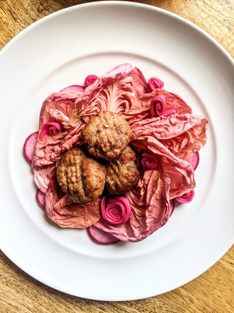 Pink themed salad with pork and lemongrass patties.