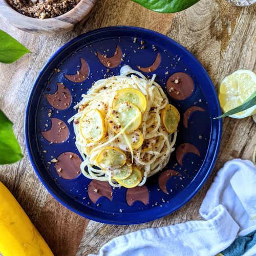 A nest of spaghetti tossed in a lemon cream sauce with thinly sliced zucchini rounds throughout. Served with homemade habanero breadcrumbs and lemon wedges.