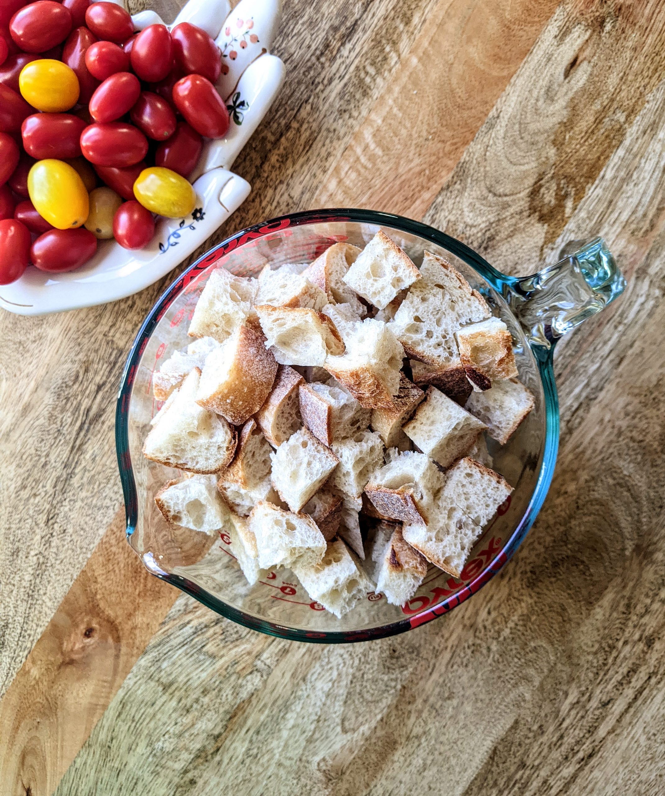 Bread cubes in a large measuring bowl