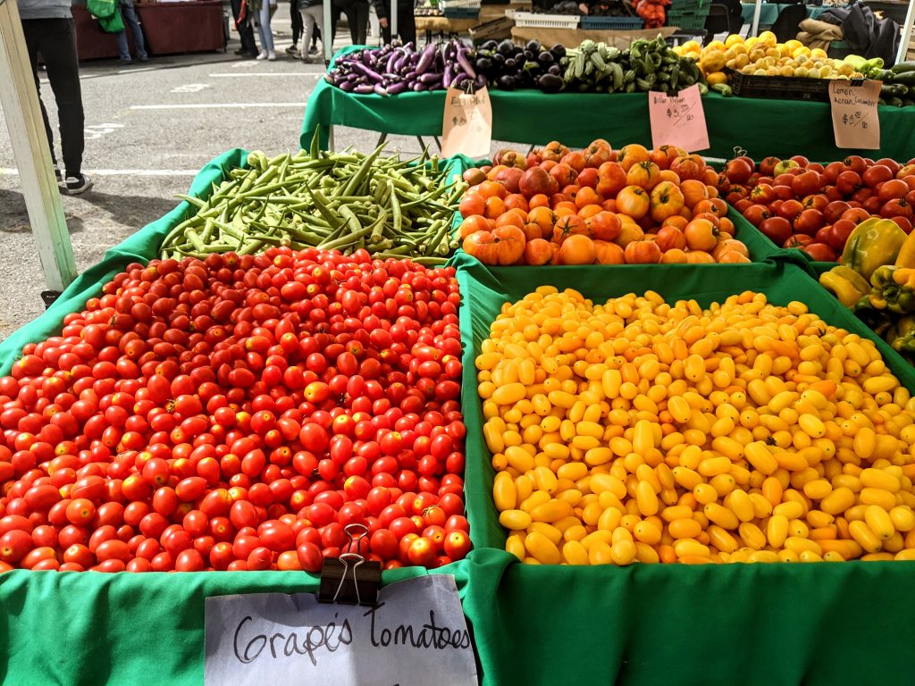 Bins of red and yellow cherry tomatoes at the Farmers Market in San Francisco.