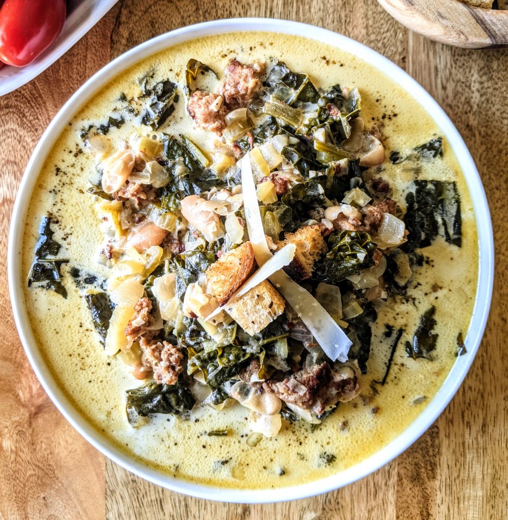 A bowl of Sausage Kale and White Bean Soup.