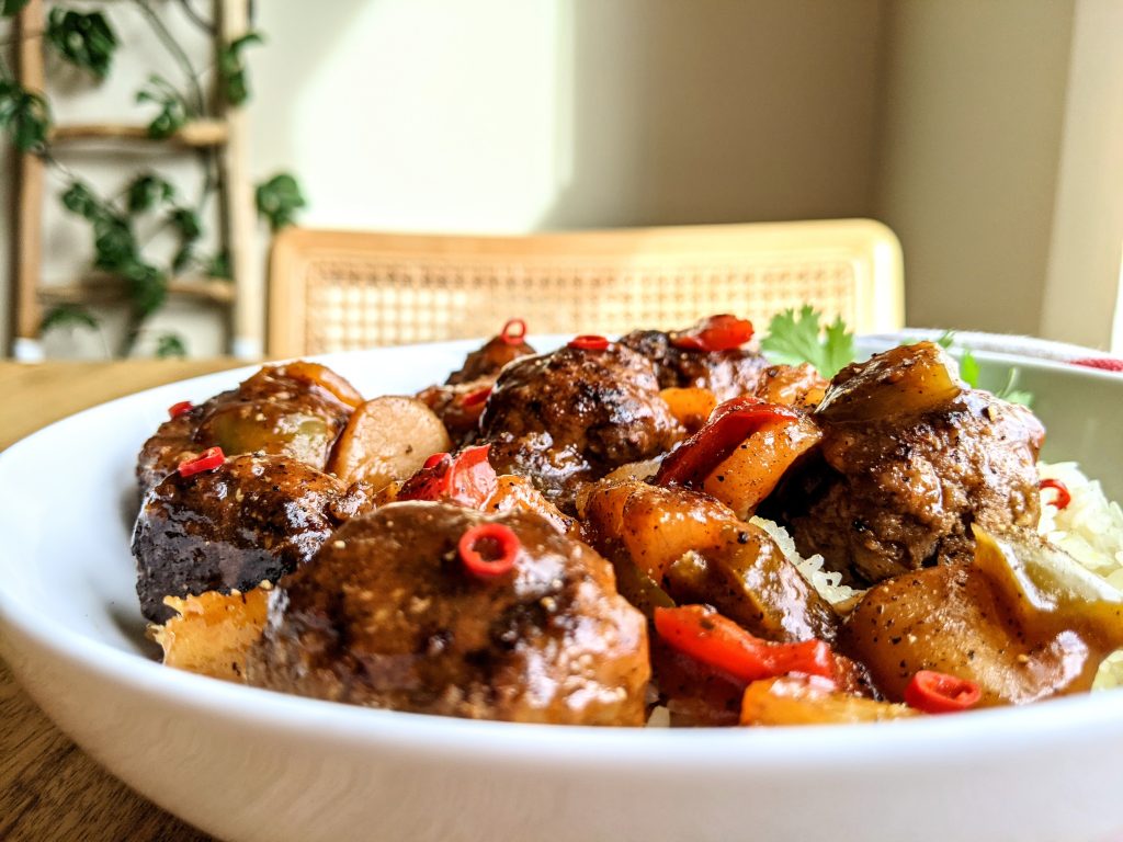 A close up shot of Sweet and Sour Meatballs.