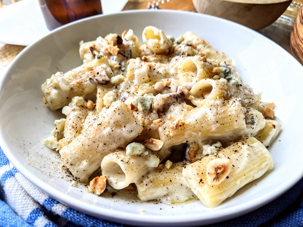 Close up of a bowl of Blue Cheese and Hazelnut Rigatoni.