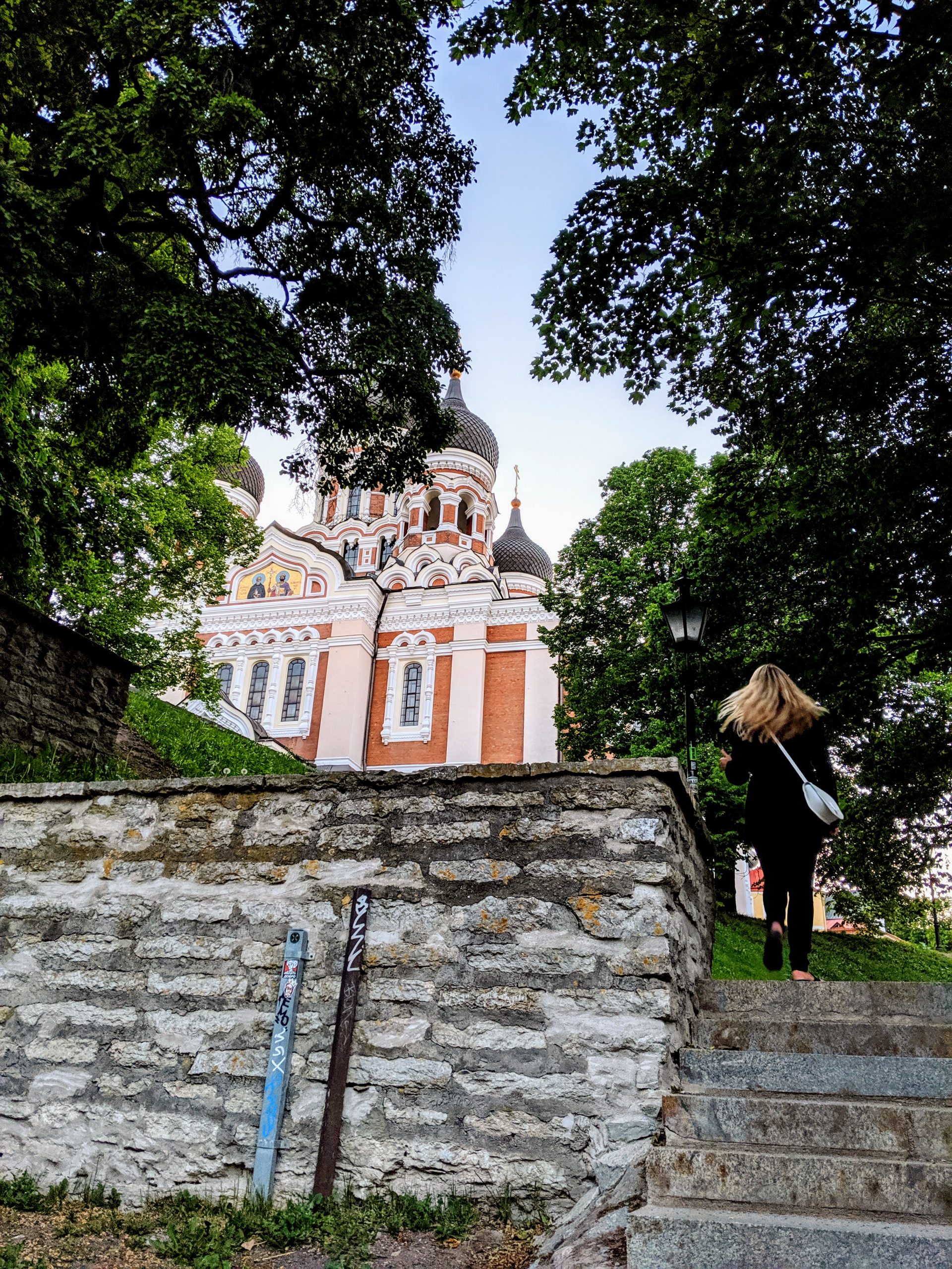Me running up a flight of stairs to Alexander Nevsky Cathedral in Tallinn