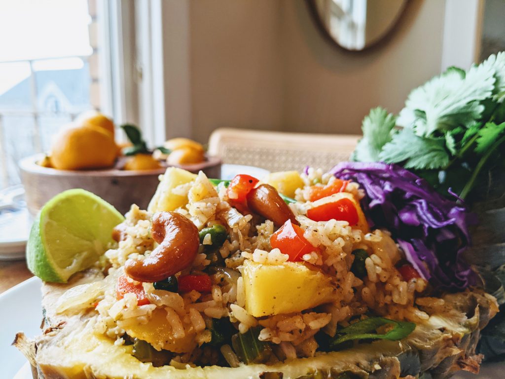 Thai-Style Pineapple Fried Rice served in a hallowed out pineapple.