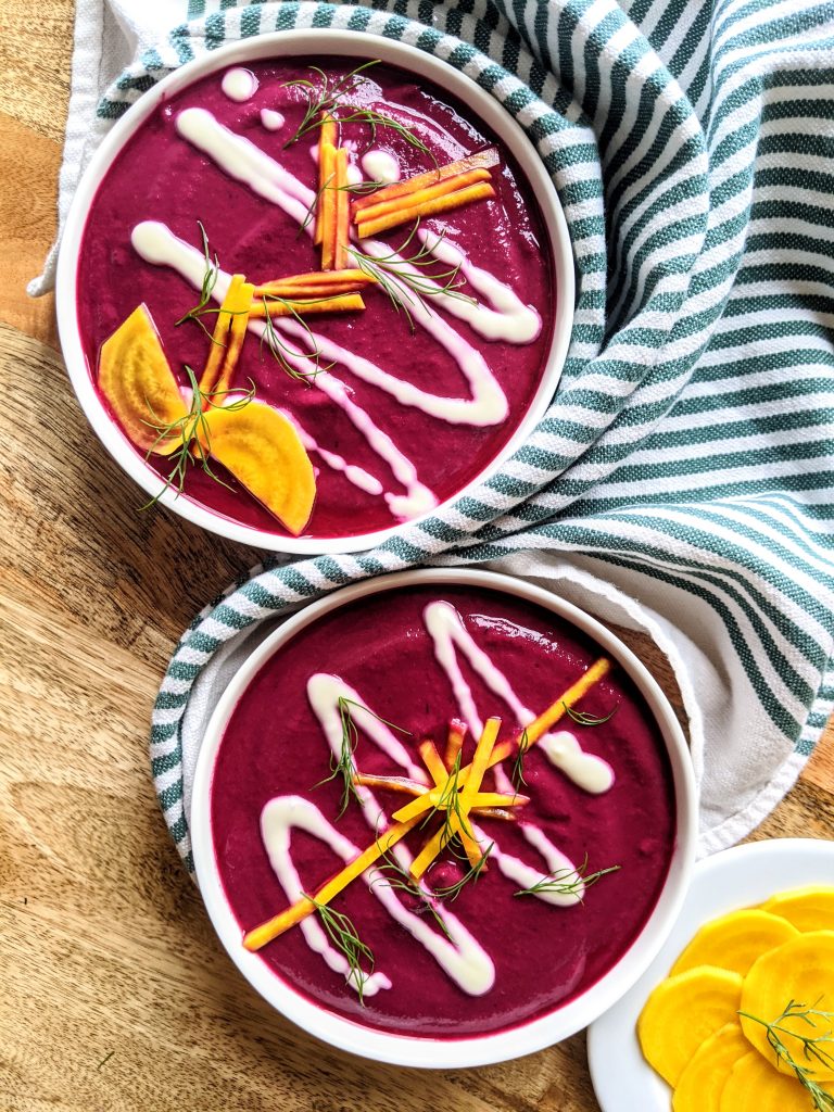 Colorful beetroot gazpacho with Greek yogurt, pickled golden beets, or fresh dill.