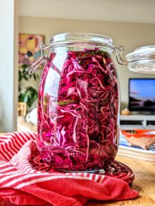 A large jar of freshly-made pickled red cabbage.