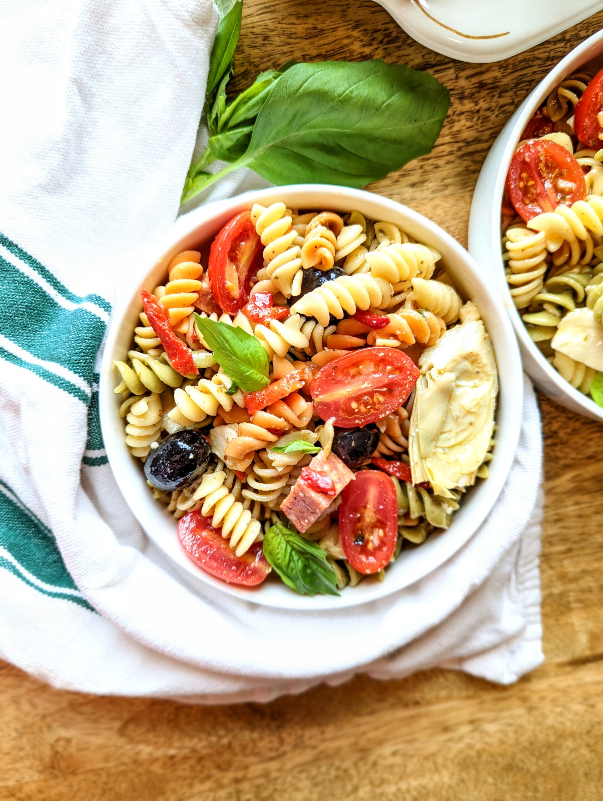 A colorful bowl of loaded antipasto pasta salad.